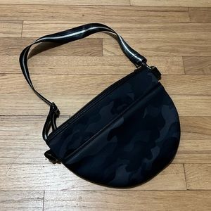 Haute Shore Used Brett Rogue Belt Bag. Black camo design with black/silver strap